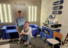 Twin brothers and entrepreneurs Dennis and Anton Teeuw, the founders of Planq. In the background, a new sofa concept, Super Sofa, can be seen.